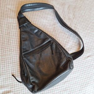 Black leather crossbody sling backpack